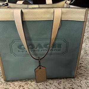 Coach bag with strap